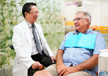 Dr. Hung with patient